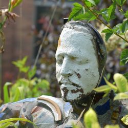 A sculpture on display in a front garden at Northwest Technical College.