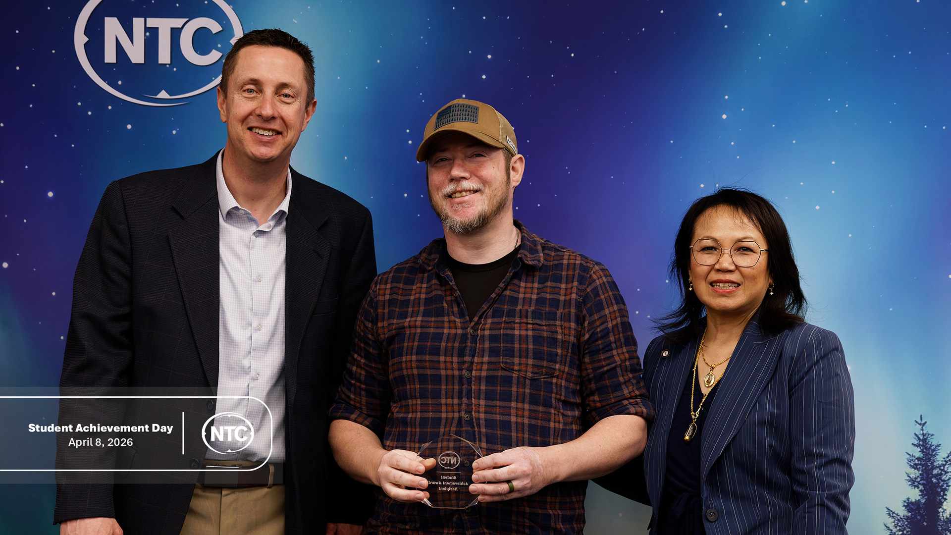 An NTC student with his Student Achievement Day award.