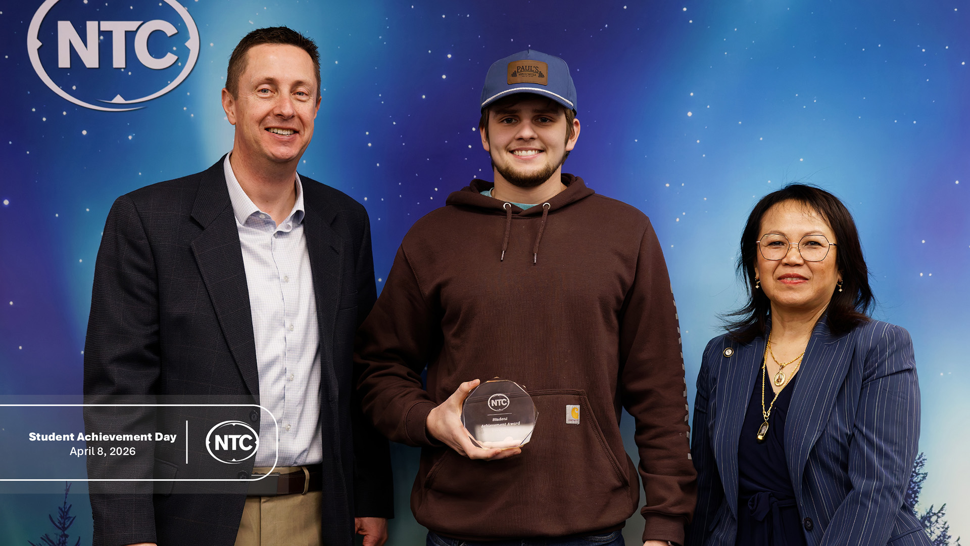 An NTC student with his Student Achievement Day award.