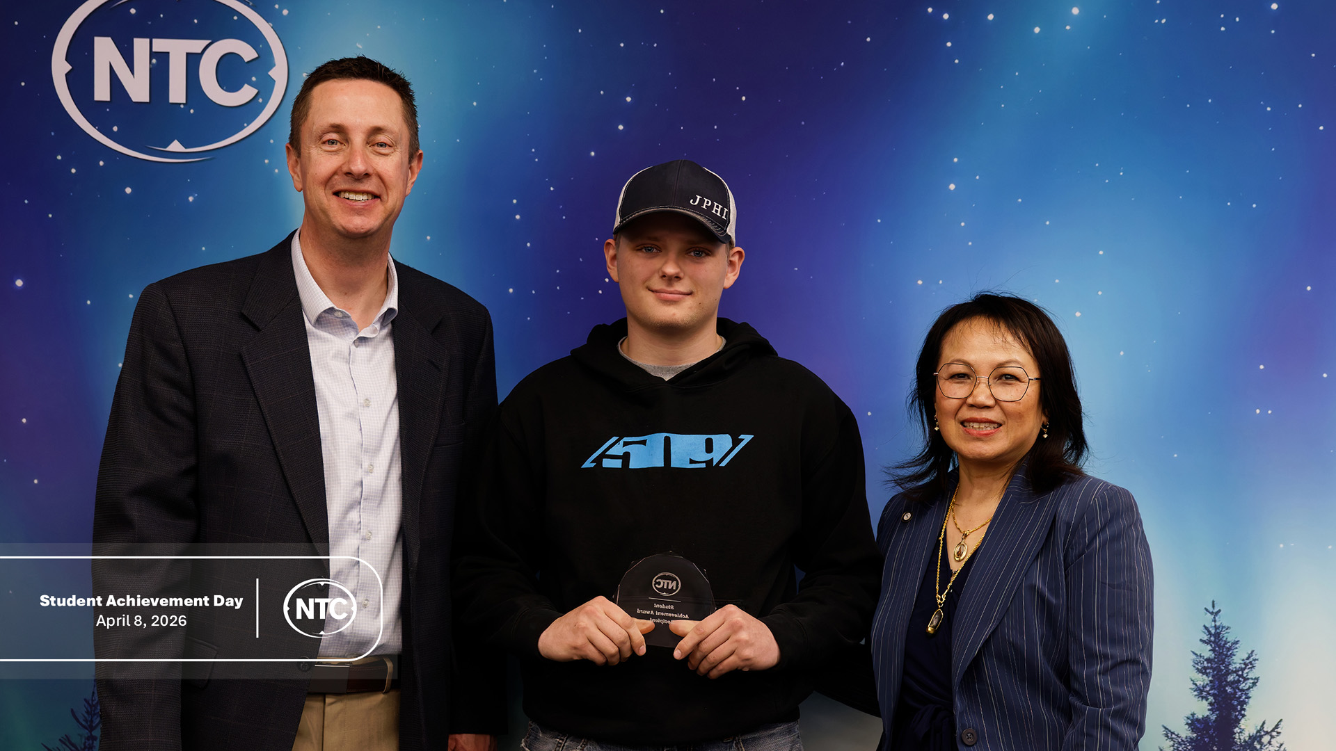 An NTC student with his Student Achievement Day award.