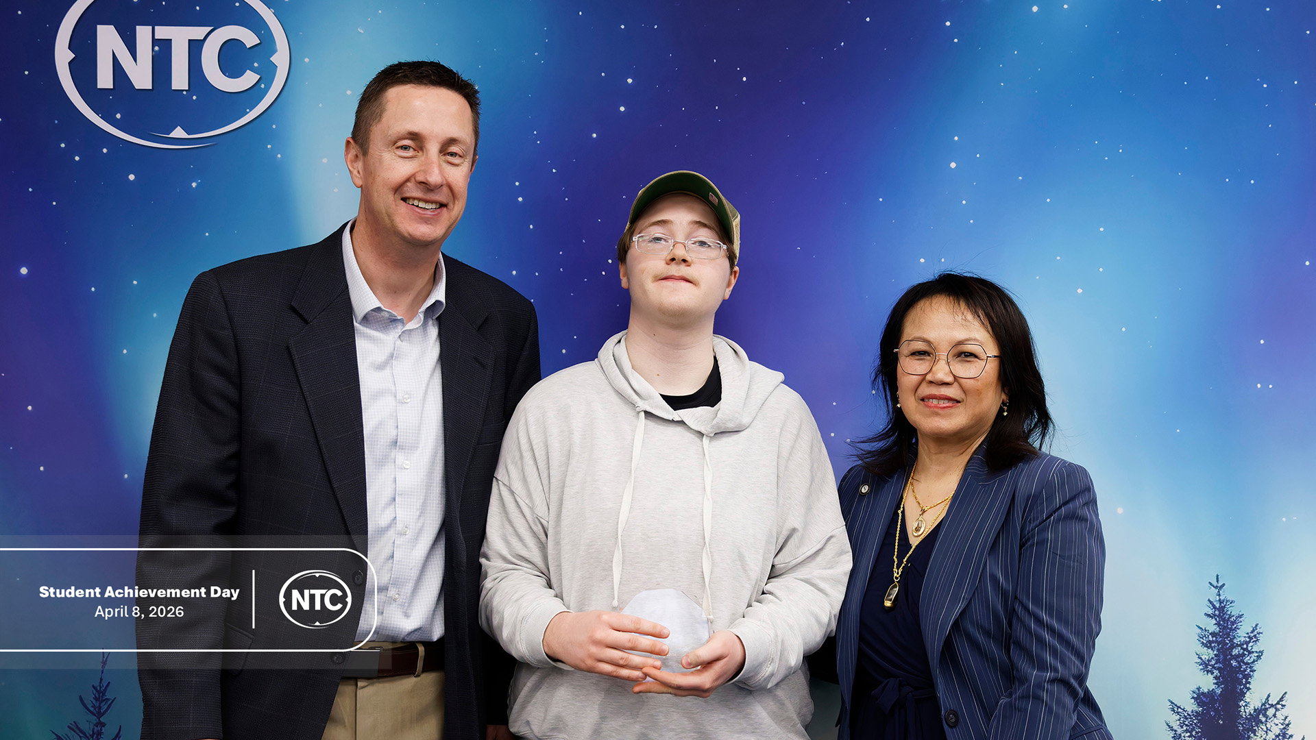 An NTC student with his Student Achievement Day award.