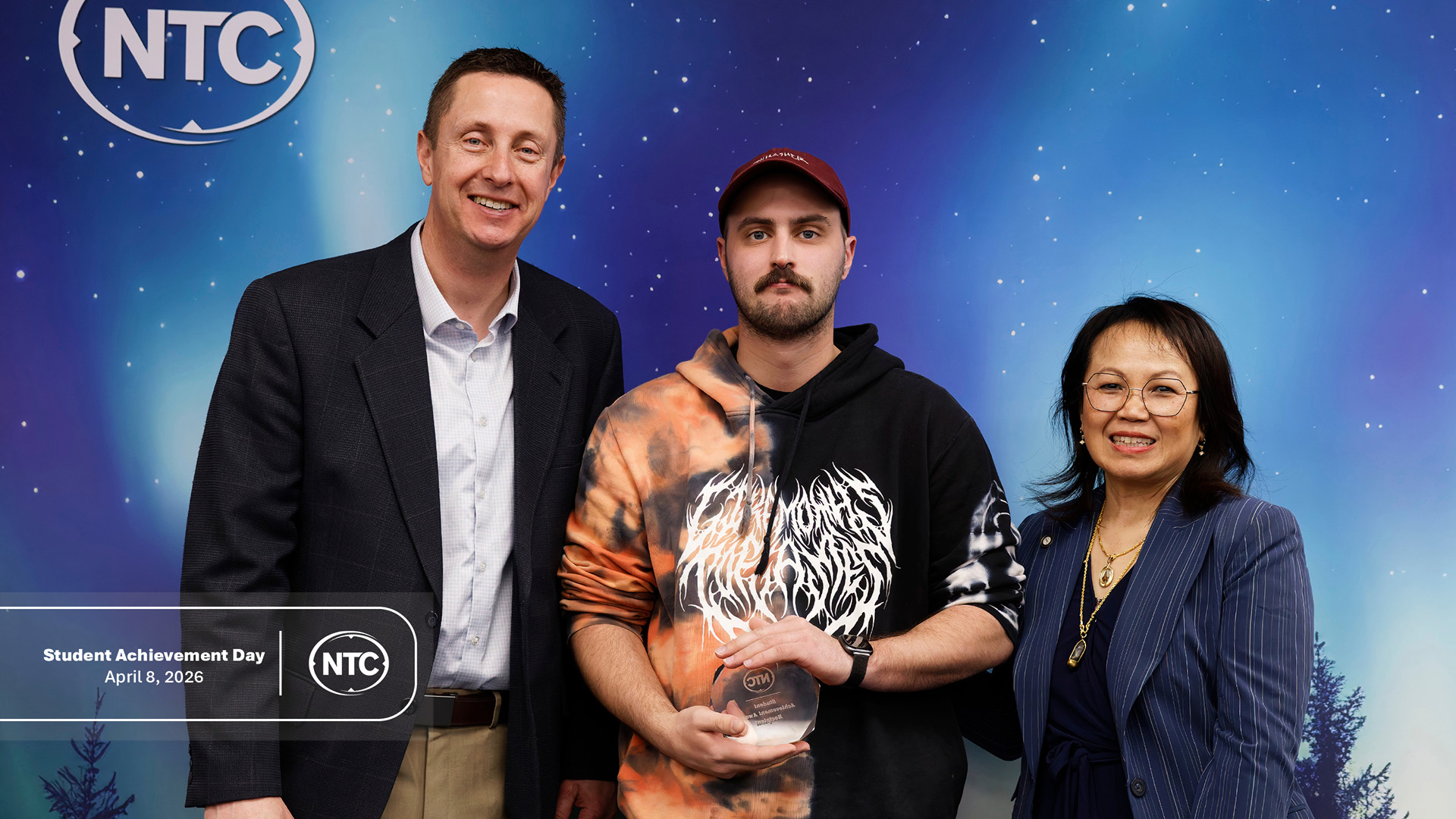 An NTC student with his Student Achievement Day award.