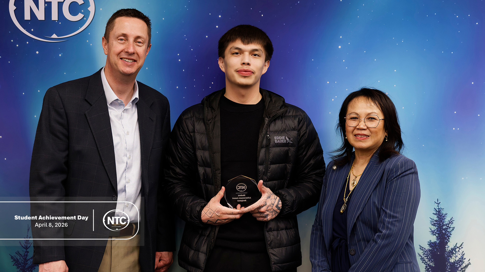 An NTC student with his Student Achievement Day award.