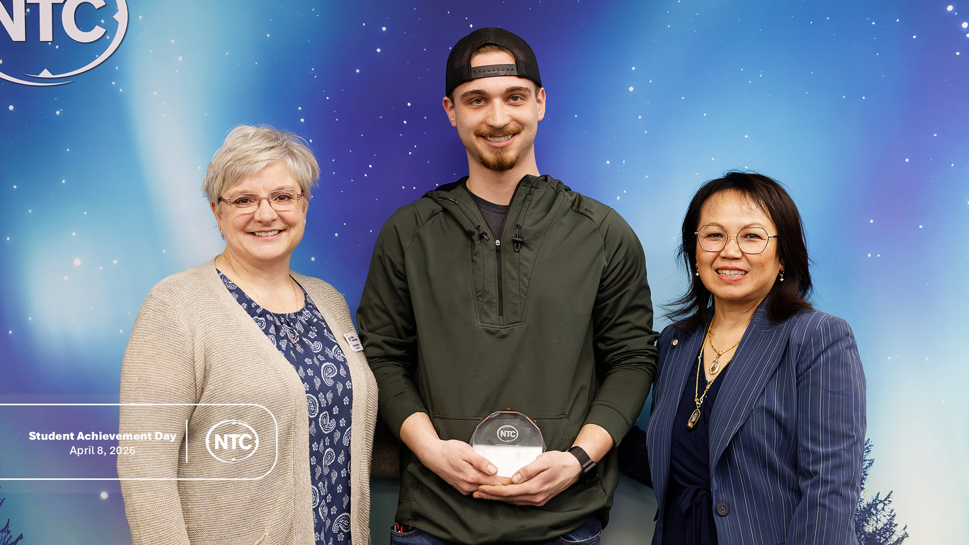 An NTC student with his Student Achievement Day award.