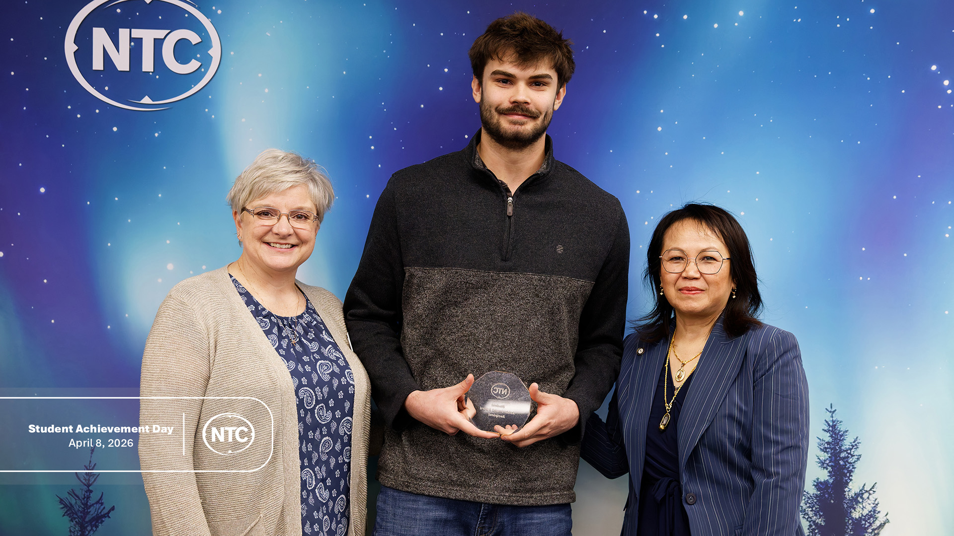 An NTC student with his Student Achievement Day award.