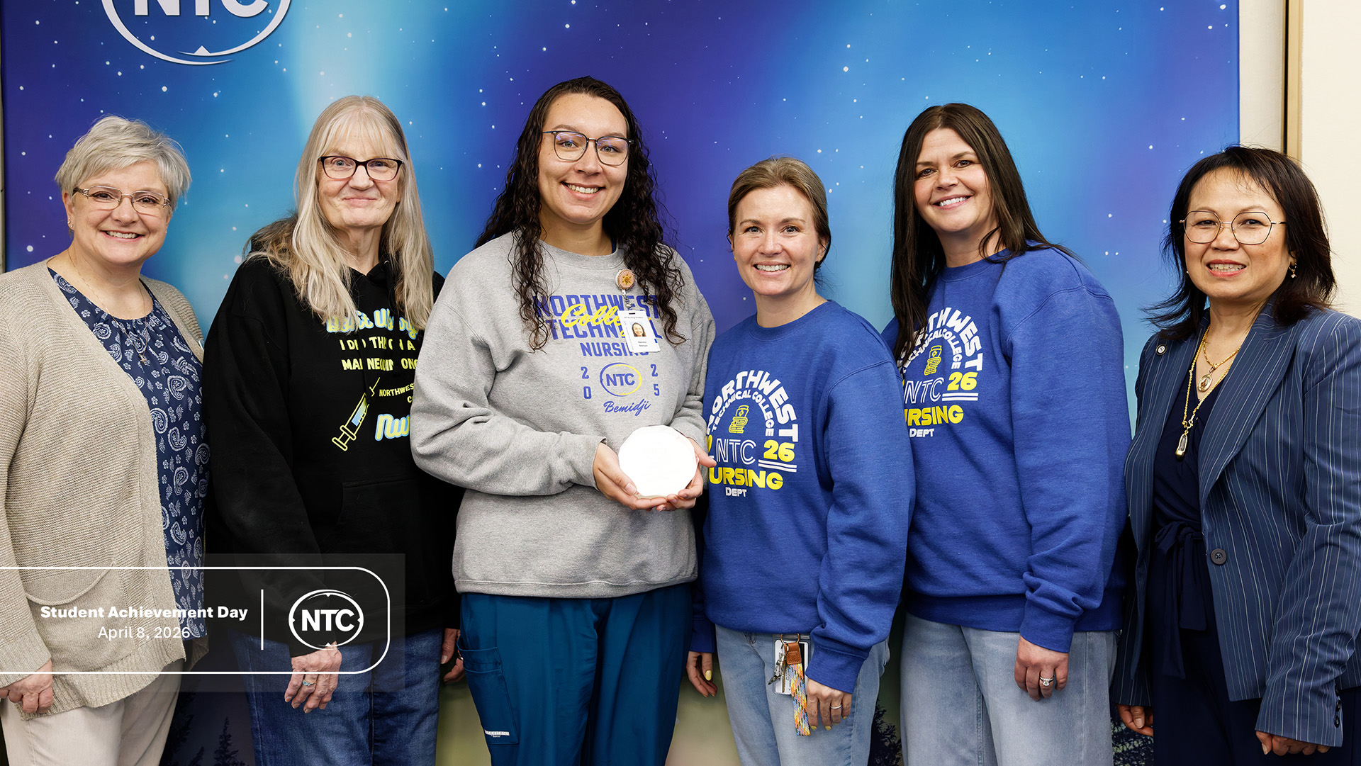 An NTC student with his Student Achievement Day award.