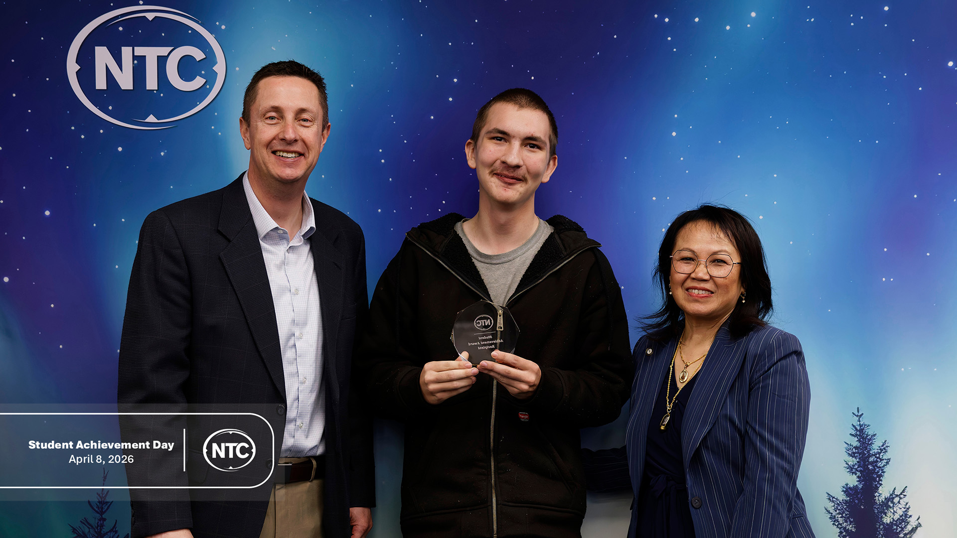 An NTC student with his Student Achievement Day award.