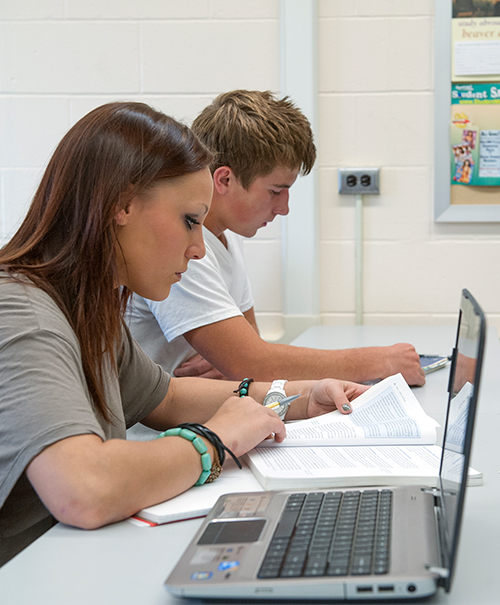 NTC Students using a laptop