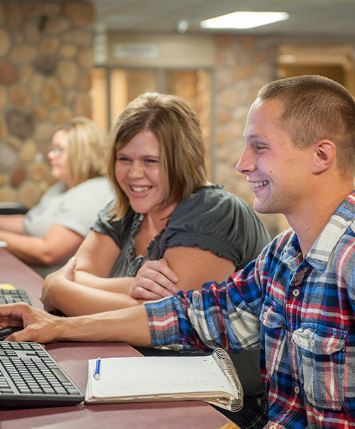 Sales and marketing students working on a project