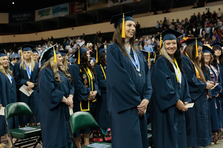 NTC graduates standing 