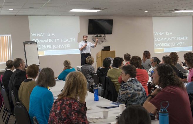 Darrin Strosahl, NTC vice president for academic affairs, speaks during the conference's opening presentation.