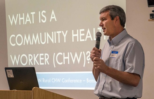 Darrin Strosahl, NTC vice president for academic affairs, speaks during the conference's opening presentation.