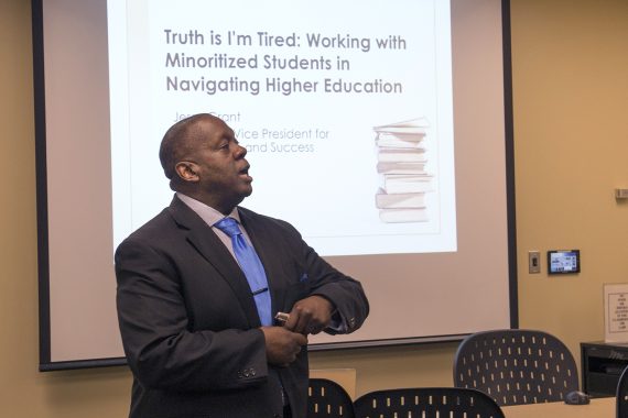 “Truth Is I’m Tired” Presentation Addresses Issues Minoritized Students Face Dr. Jesse Grant speaking at the professional development workshop.