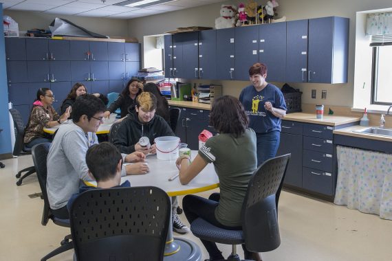 Cass Lake-Bena Freshmen Explore Career Paths at Northwest Technical College Heather Sutherland, early childhood education faculty, working with high school students.