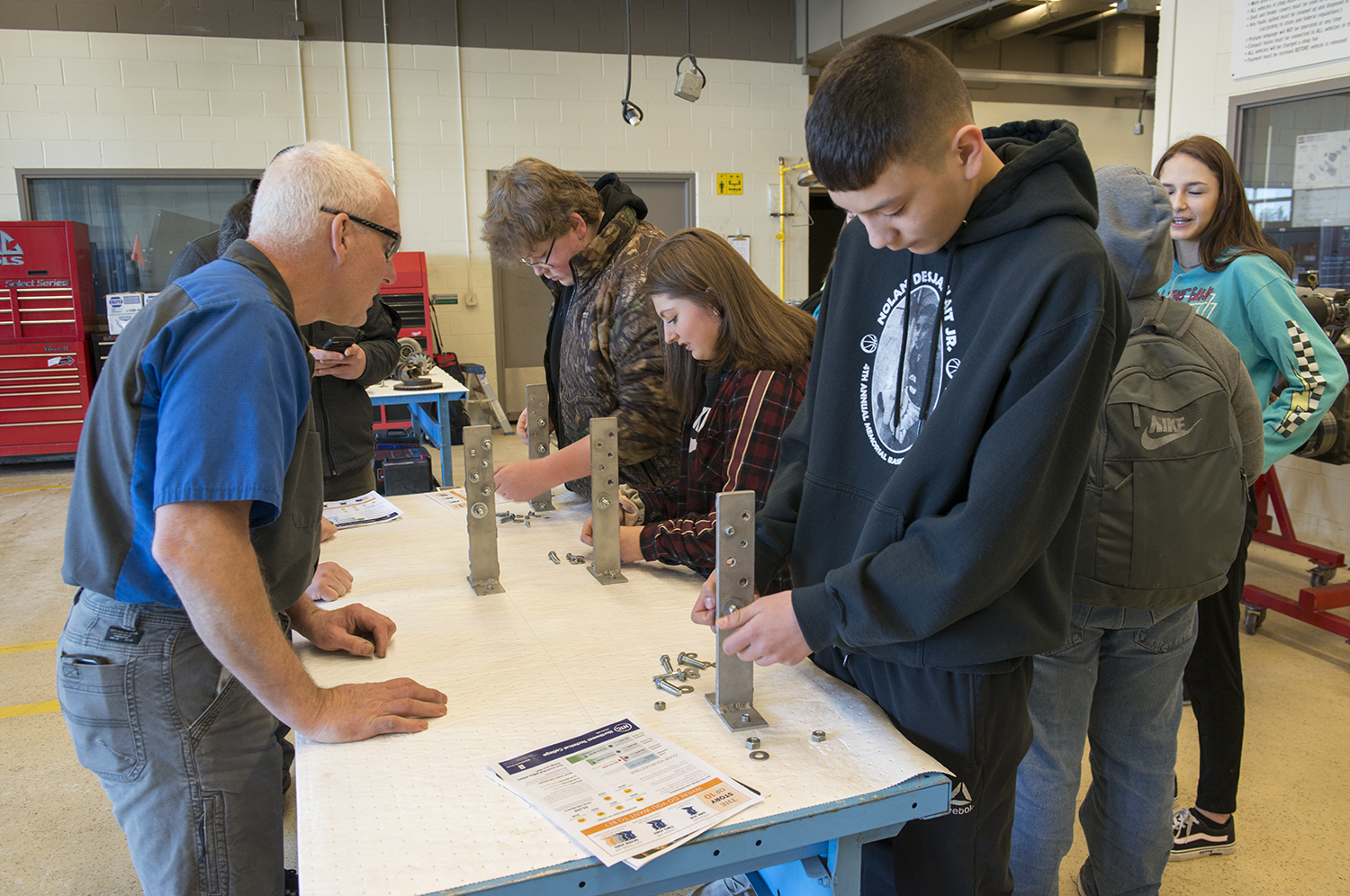 Ninth graders from Blackduck High School visiting NTC exploring automotive career pathways in the automotive lab.