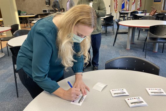 Sherry Lawdermilt, CIO, writing a name tag