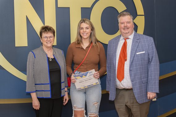 Abrial Troubly holding her outstanding student award.