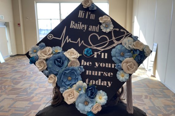 Northwest Tech Class of 2022 graduation cap that says "Hi, I'm Bailey and I'll be your nurse today"