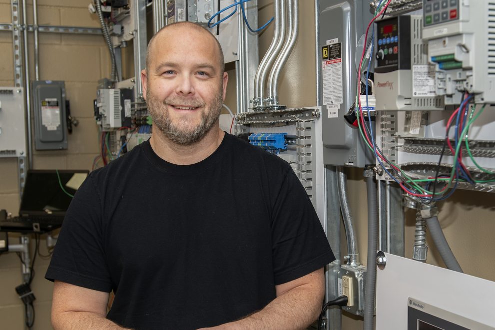 Pete Thul standing in NTC’s new programmable logic controller lab