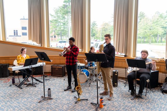 Student musicians performing at the retirement reception