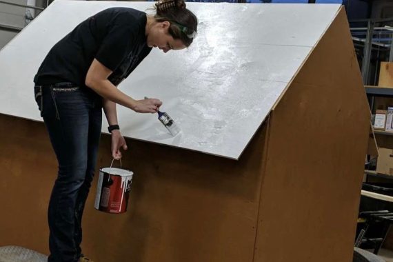 An NTC student helps construct a float for the Night We Light Parade in downtown Bemidji on Nov. 25