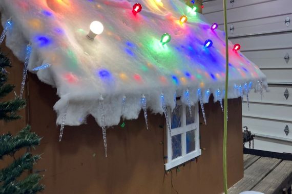 An NTC student helps construct a float for the Night We Light Parade in downtown Bemidji on Nov. 25