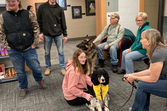 NTC students play with dogs and cats during the college's de-stress with pets event on Dec. 13