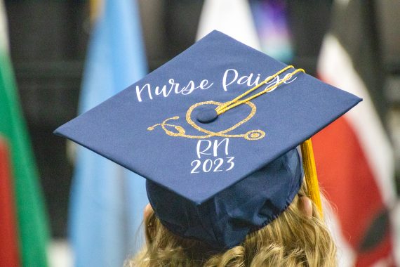 A graduation cap with the words "Nurse Paige: RN 2023"