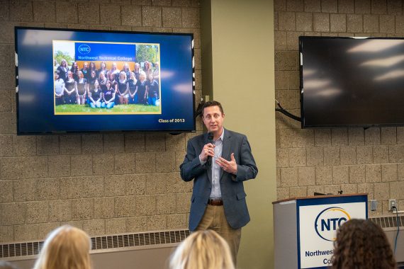 President John Hoffman speaks to attendees