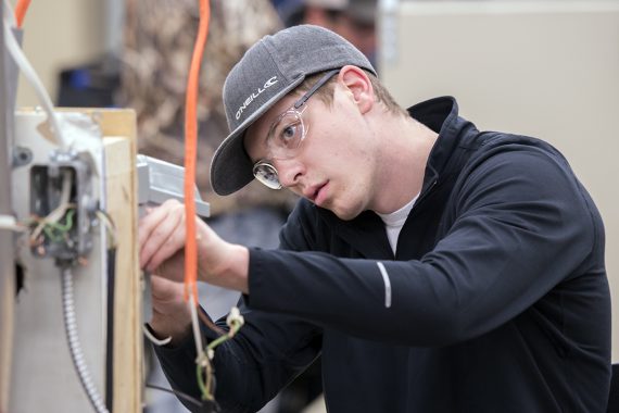 An NTC student working with some electrical wires