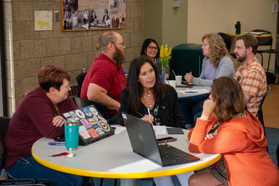 NTC staff members speak during the Aug. 17 in-service at the NTC commons