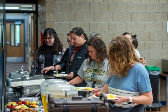 NTC staff eat breakfast before the fall in-service on Aug. 17
